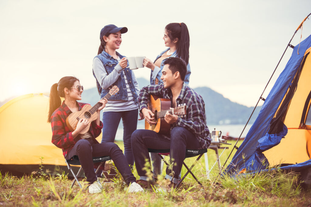 Group of Asian friendship clinking drinking bottle glass for cel